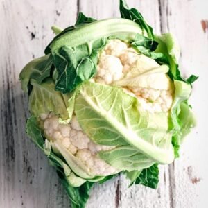 cauliflower on white wooden surface