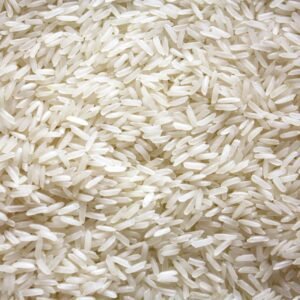 a pile of white rice sitting on top of a table