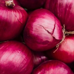 a pile of red apples
